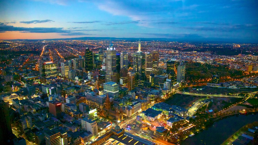 Eureka Tower showing a high-rise building, a sunset and views