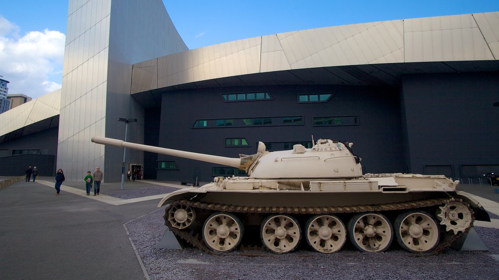 Imperial War Museum North featuring military items