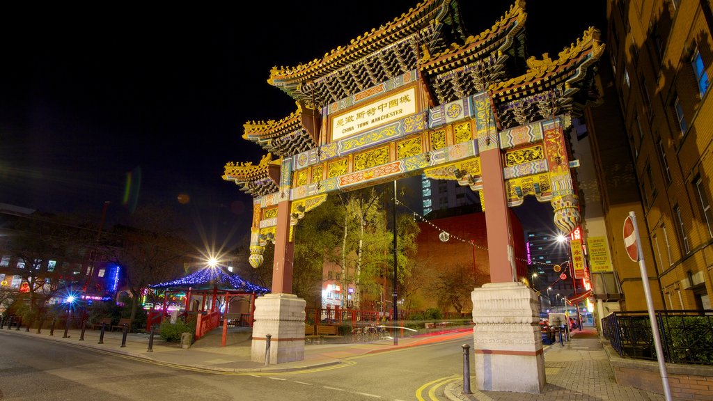 Chinatown which includes night scenes, a city and street scenes