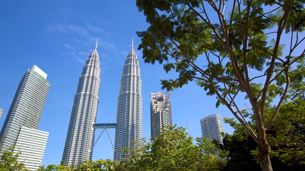 KLCC Park which includes a park, a city and a high-rise building