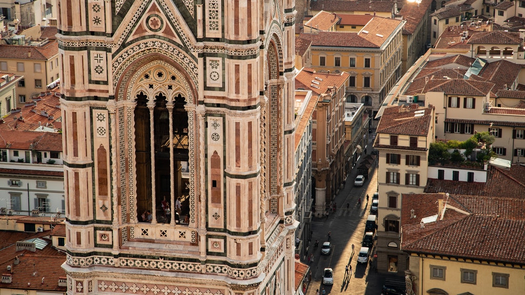 Giotto\'s Campanile showing a city, heritage architecture and landscape views