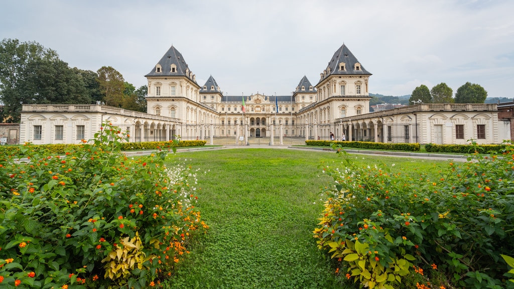 Valentino Castle featuring wild flowers, a park and heritage architecture