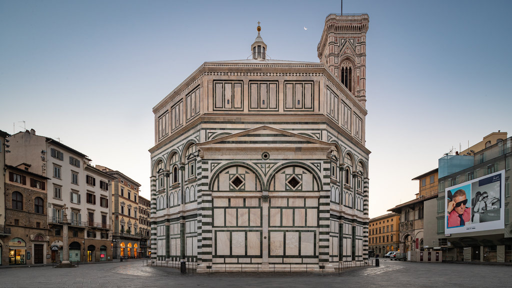 Florence Baptistery showing heritage architecture and a sunset