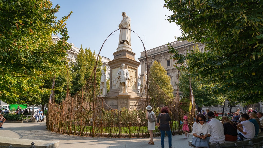 Piazza della Scala which includes a statue or sculpture, heritage elements and a garden