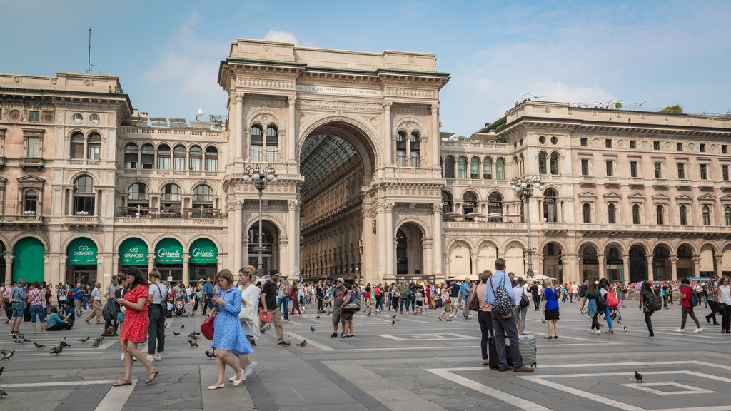 Piazza del Duomo which includes a square or plaza, street scenes and heritage architecture