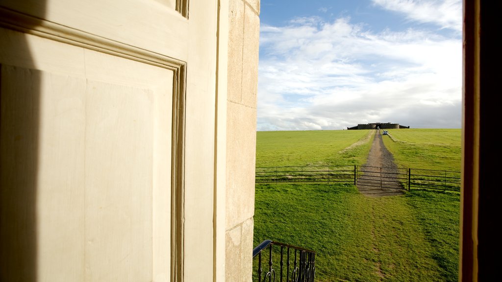 Mussenden Temple which includes tranquil scenes and a temple or place of worship