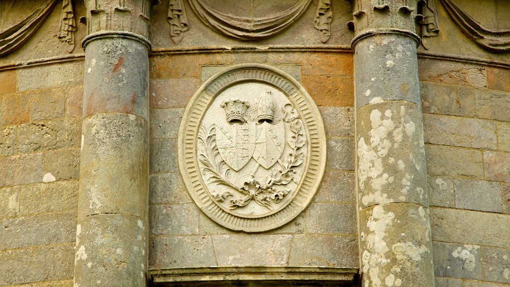 Mussenden Temple showing a temple or place of worship, signage and heritage elements