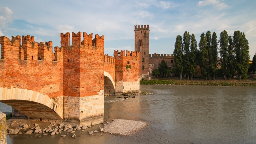 Ponte Scaligero featuring a bridge, heritage elements and a river or creek