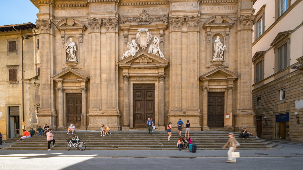 Historic Center - Downtown which includes heritage architecture and street scenes as well as a small group of people