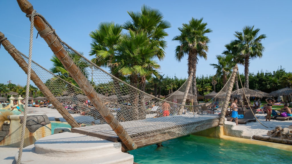 Aqualandia which includes a bridge, a waterpark and a pool