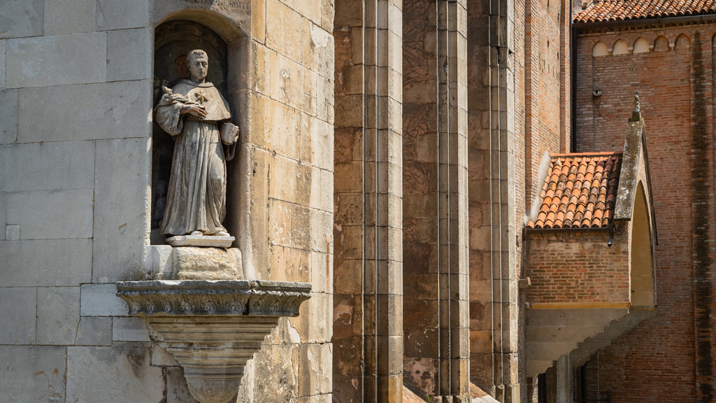 Church of the Eremitani showing heritage elements, religious aspects and a statue or sculpture