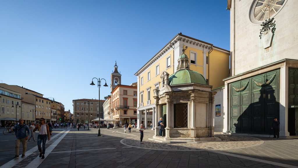 Piazza Tre Martiri featuring heritage elements and street scenes