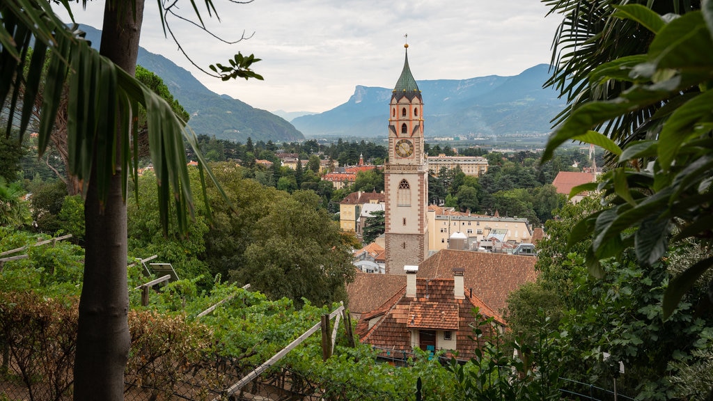 St. Nicholas Church featuring a small town or village, landscape views and heritage elements