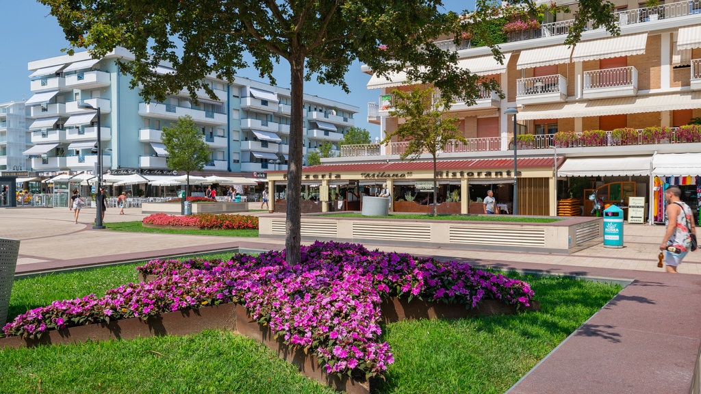 Plaza Milano ofreciendo flores