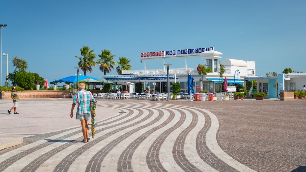 Piazzale Roma som viser en plads eller et torv og gadeliv såvel som en mand