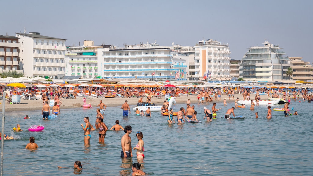 Papeete Beach which includes general coastal views, swimming and a coastal town