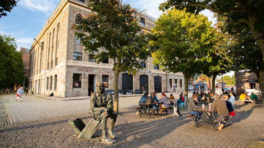 Arnolfini Gallery que incluye imágenes de calles, comidas al aire libre y una estatua o escultura