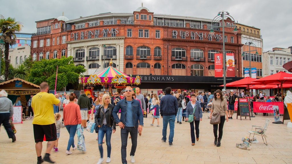 The Square featuring street scenes as well as a large group of people