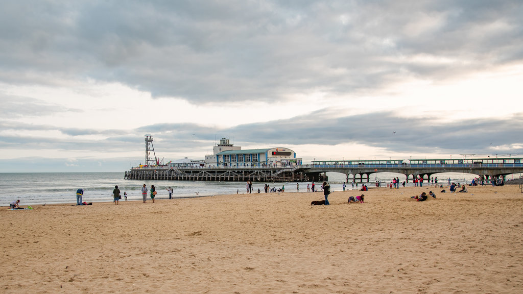 Bournemouth Pier showing a beach, general coastal views and a sunset