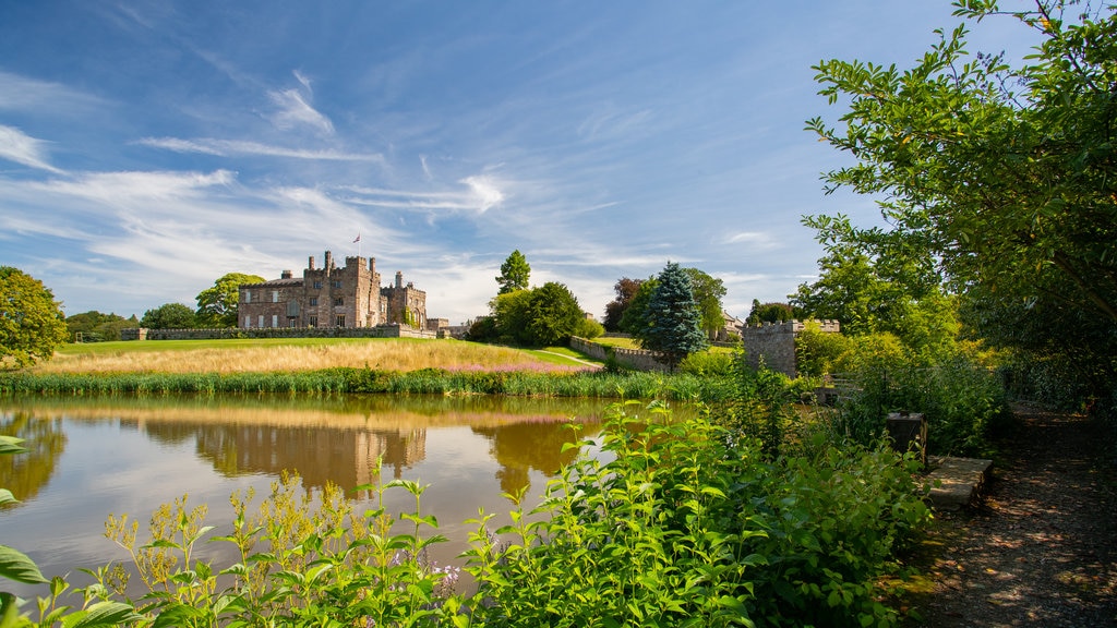 Ripley Castle and Gardens featuring heritage architecture, a lake or waterhole and a castle