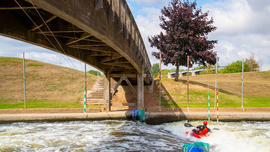 National Water Sports Centre showing kayaking or canoeing, a bridge and a river or creek