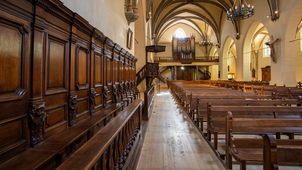 Church of St. Maurice which includes a church or cathedral, heritage elements and interior views