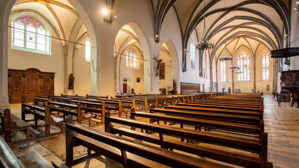 Church of St. Maurice which includes heritage elements, a church or cathedral and interior views