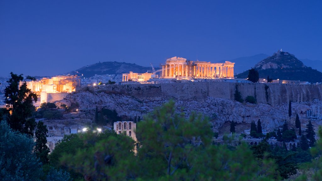 Acropolis showing night scenes, a ruin and heritage elements