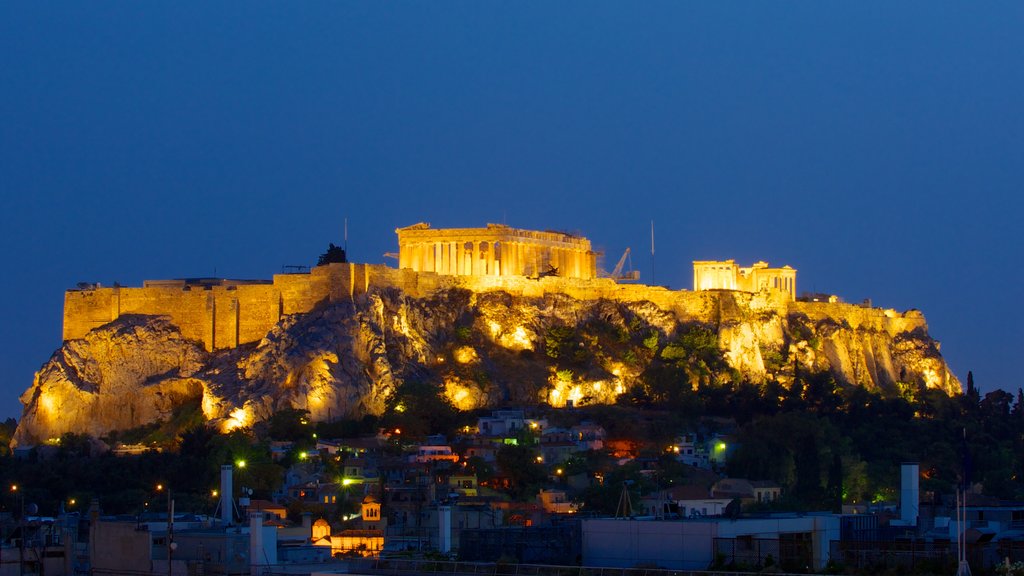 Acropolis which includes a city, night scenes and building ruins