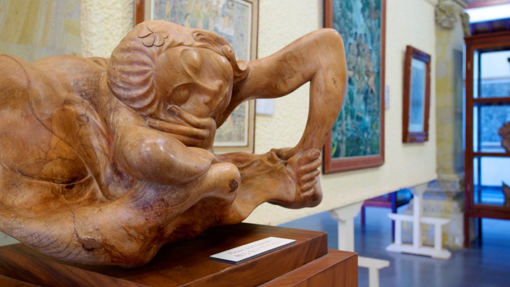 Puri Lukisan Museum featuring a statue or sculpture, art and interior views