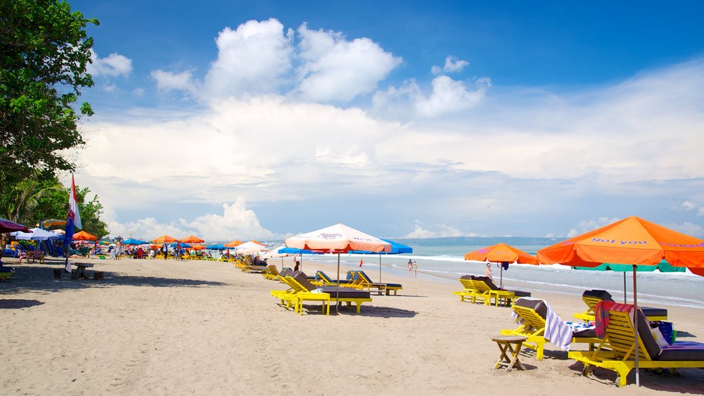 Double Six Beach which includes tropical scenes and a sandy beach