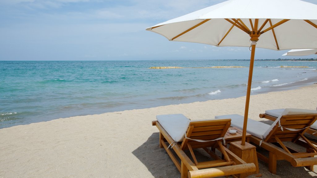 Kuta showing a sandy beach and a luxury hotel or resort