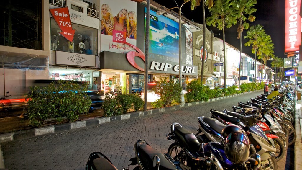 Kuta which includes street scenes, night scenes and a city