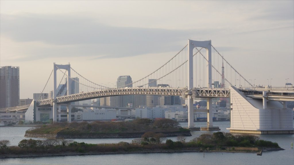 Rainbow Bridge which includes a bridge, a city and general coastal views