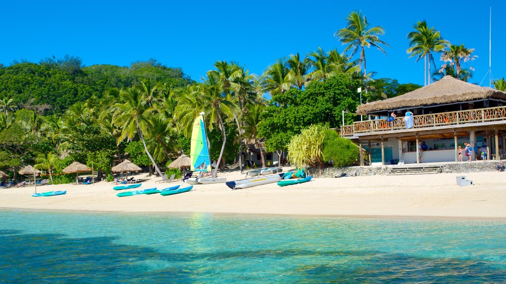 Castaway Island showing a sandy beach and a luxury hotel or resort