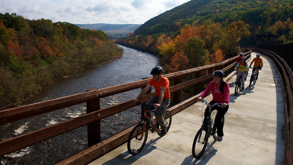 Pocono Mountains featuring fall colors, a river or creek and cycling