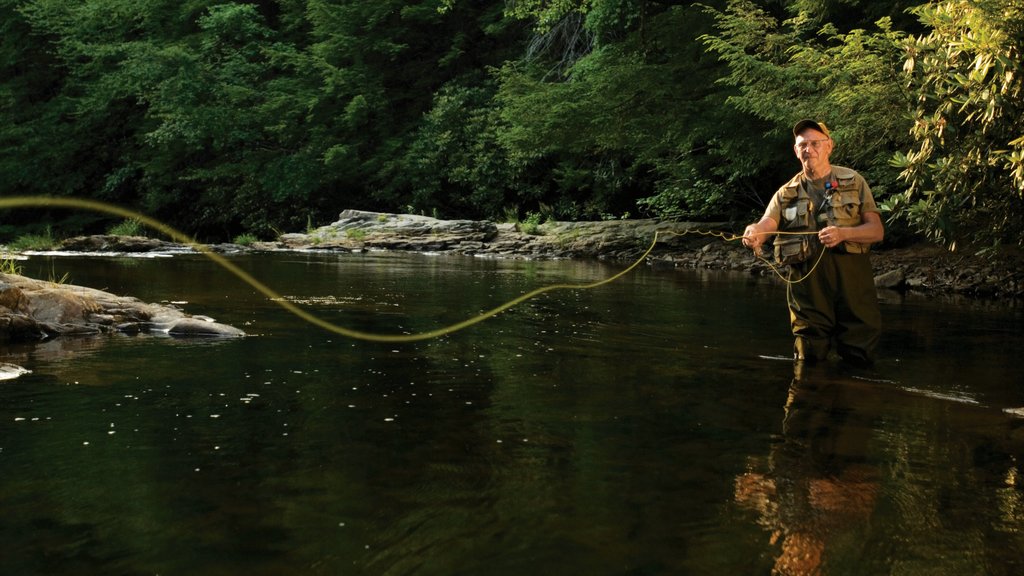 Pocono Mountains featuring a river or creek and fishing as well as an individual male