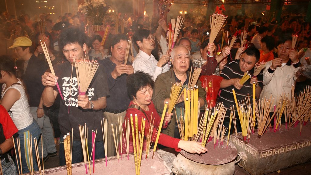 Wong Tai Sin Temple featuring religious elements, interior views and a temple or place of worship