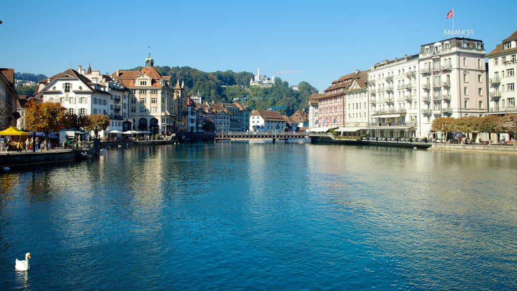 Old Town Lucerne which includes a coastal town, heritage architecture and a river or creek