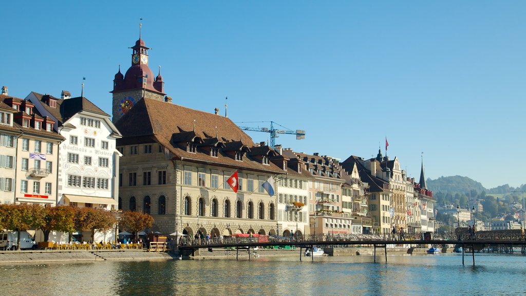 Old Town Lucerne which includes heritage architecture, a river or creek and a bridge