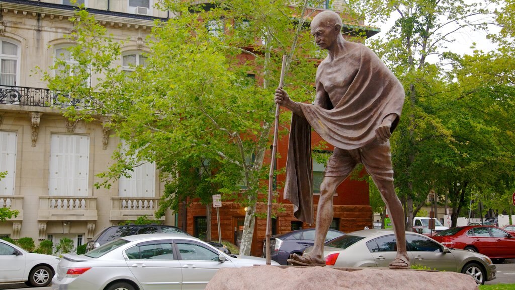 Dupont Circle which includes a monument and a statue or sculpture