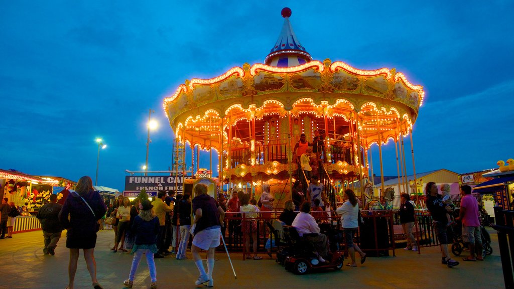 Steel Pier featuring night scenes, nightlife and rides