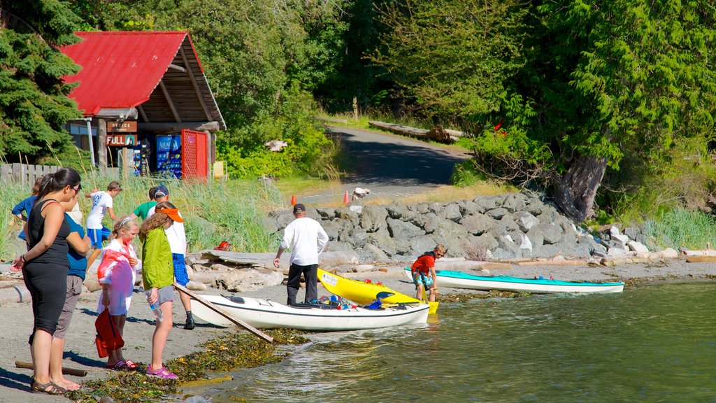 San Juan County Park which includes a lake or waterhole as well as a small group of people