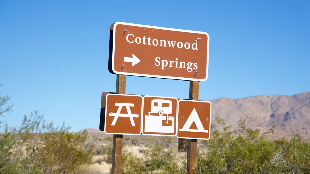 Cottonwood Springs which includes desert views and signage