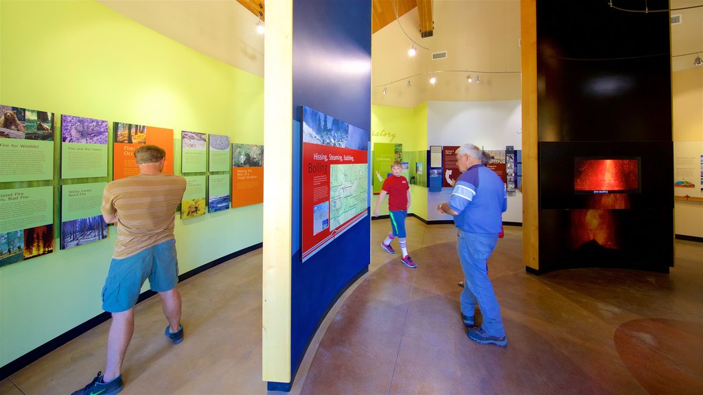 Kohm Yah-mah-nee Visitor Center which includes interior views as well as a small group of people