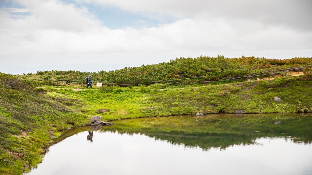 Daisetsuzan National Park which includes tranquil scenes and a lake or waterhole