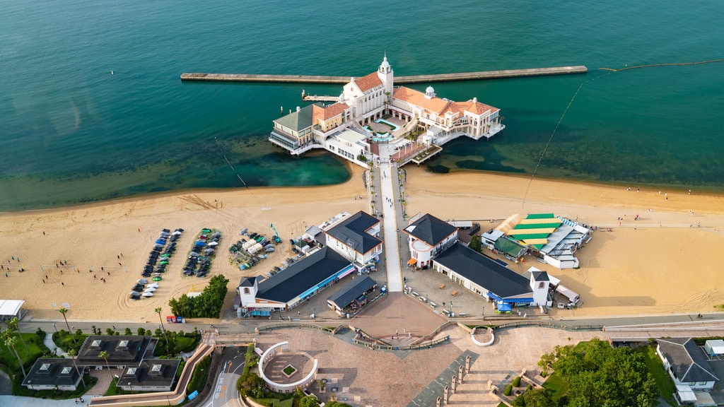 Fukuoka Tower showing a hotel, a sandy beach and general coastal views