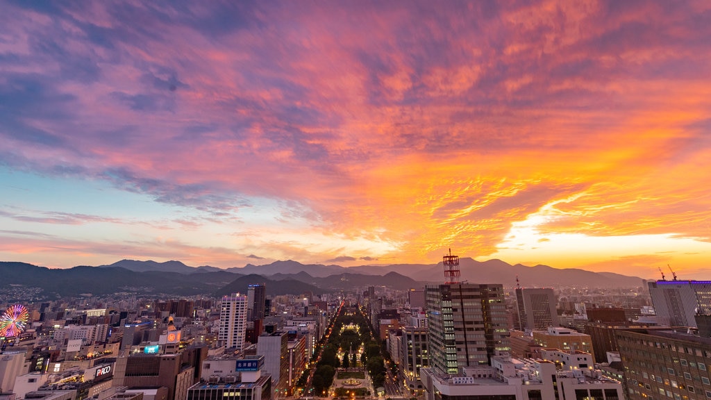 Sapporo TV Tower featuring a city, a sunset and landscape views