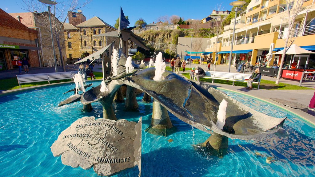 Salamanca Place showing outdoor art, a fountain and a city