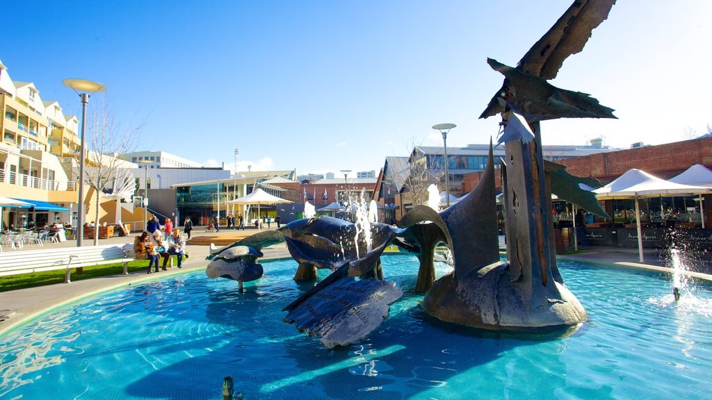 Salamanca Place featuring a city, outdoor art and a pond